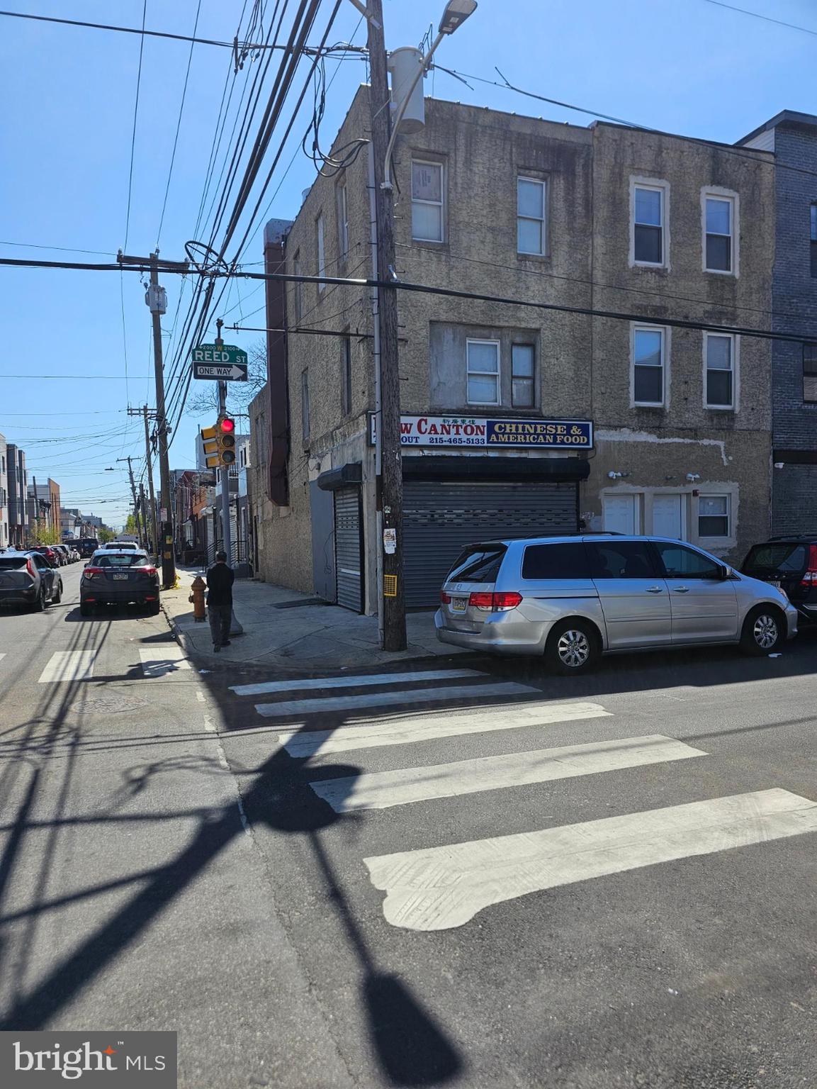 2102 Reed Street Philadelphia, PA 19146 - Photo 8 of 9 a view of a street with cars