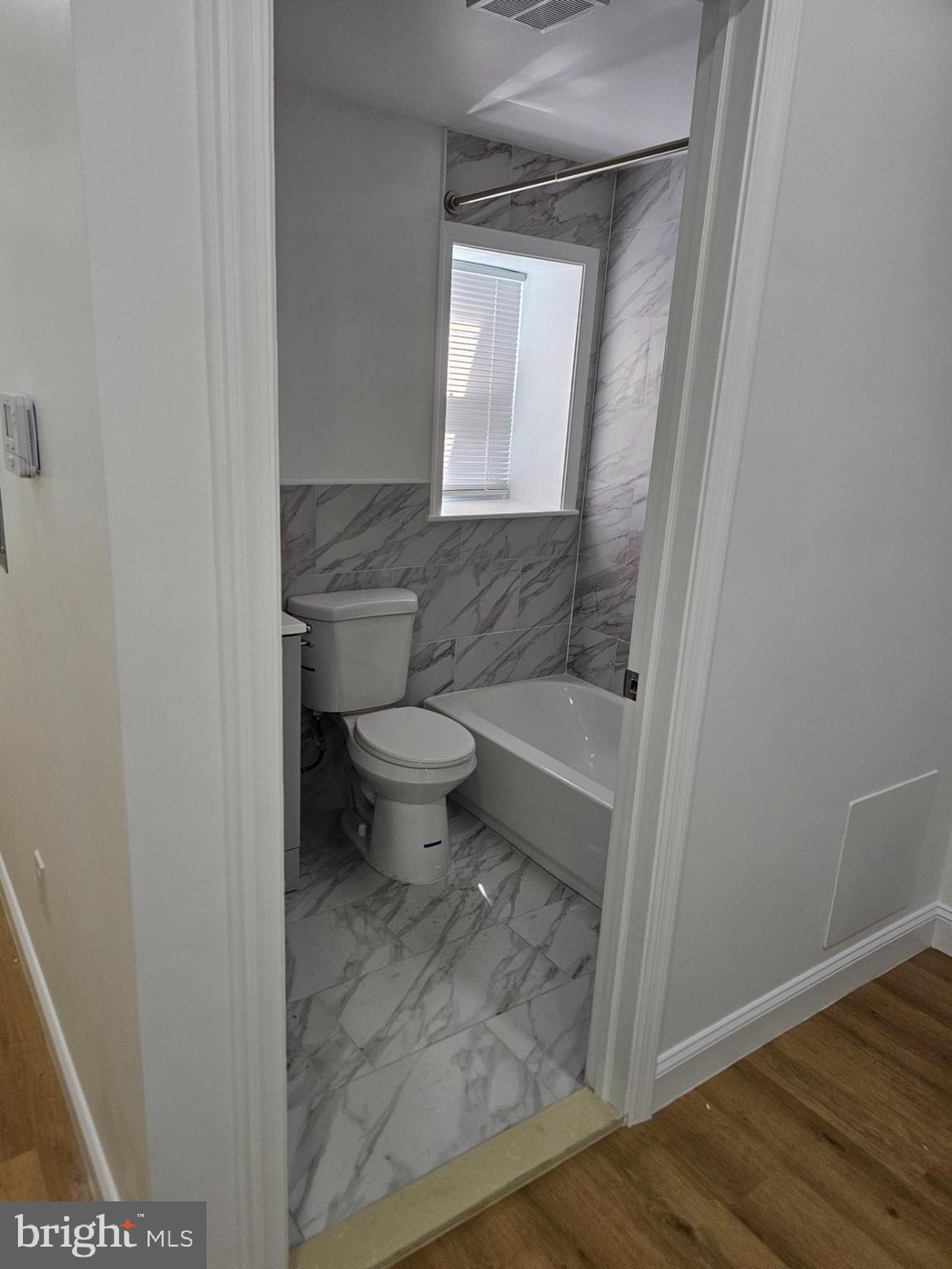 2102 Reed Street Philadelphia, PA 19146 - Photo 9 of 9 a bathroom with a sink and a toilet