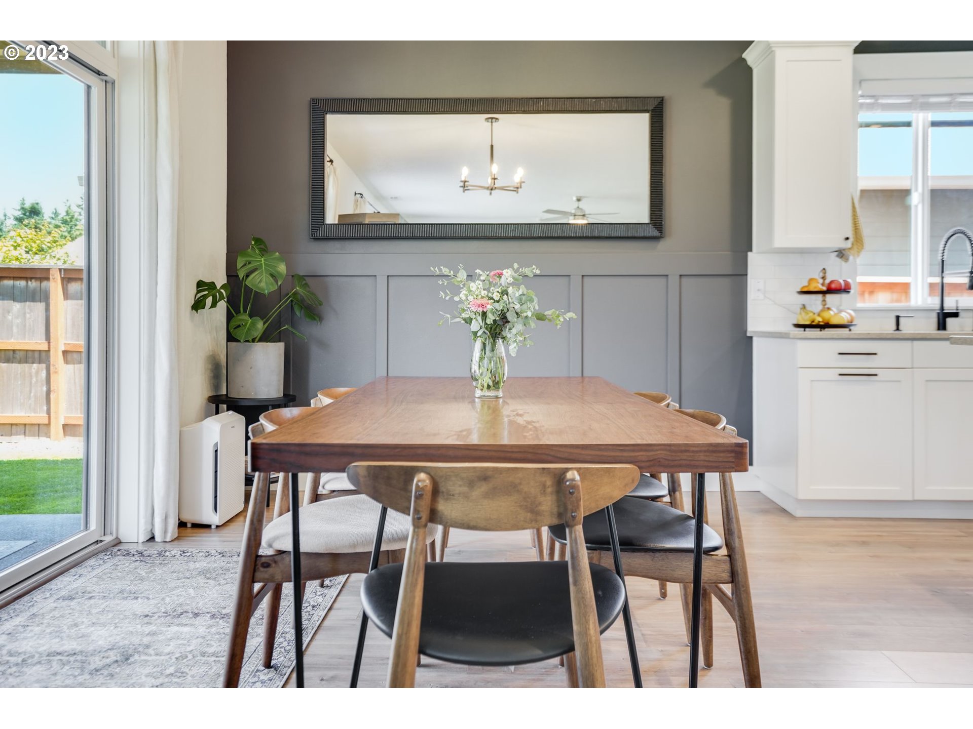 2889 4th Street Hubbard, OR 97032 - Photo 12 of 37 a dining room with furniture and wooden floor