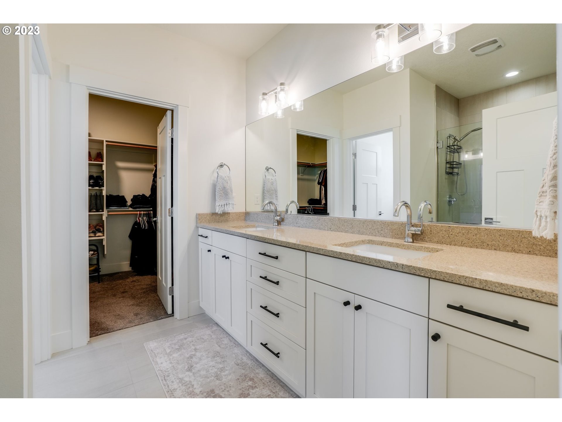 2889 4th Street Hubbard, OR 97032 - Photo 18 of 37 a bathroom with a granite countertop sink mirror and