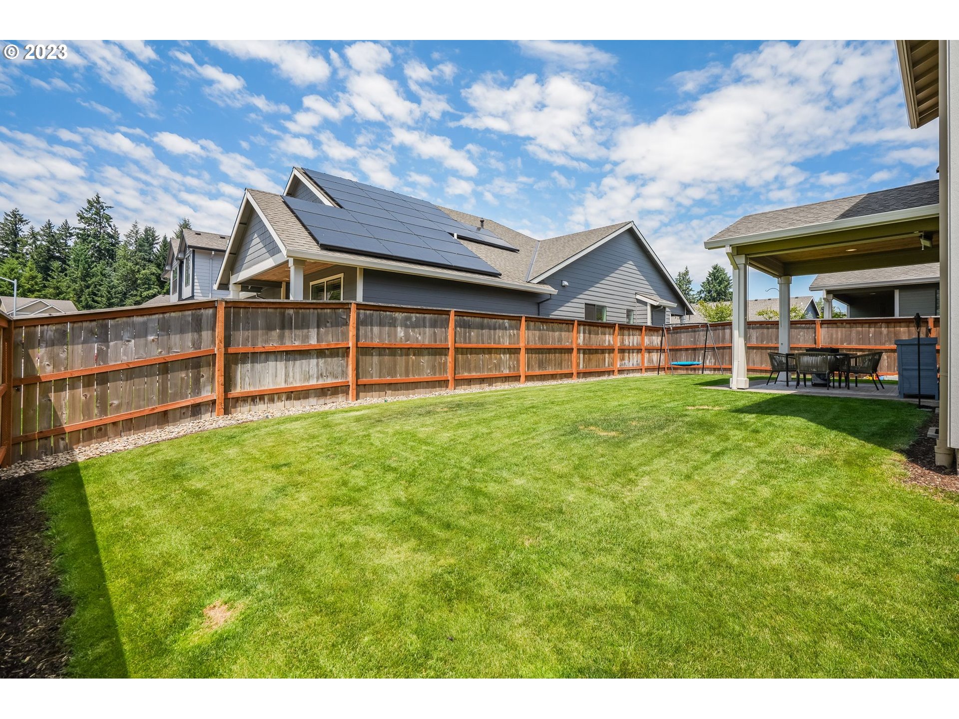 2889 4th Street Hubbard, OR 97032 - Photo 31 of 37 a view of a house with a backyard