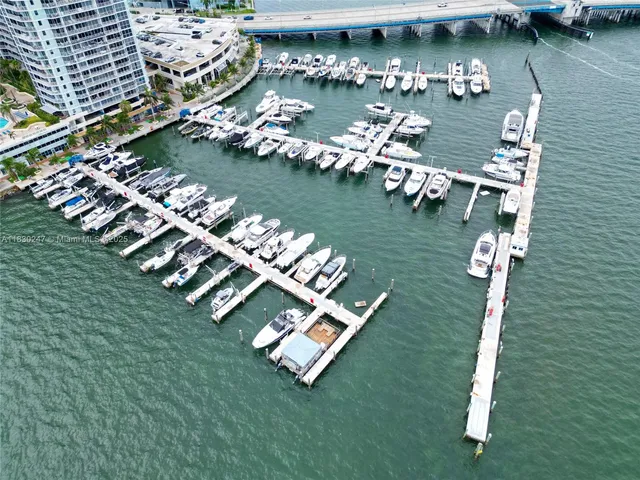 an aerial view of a house having yard table and chairs