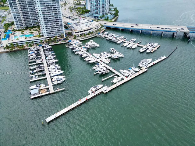 an aerial view of a house with outdoor space