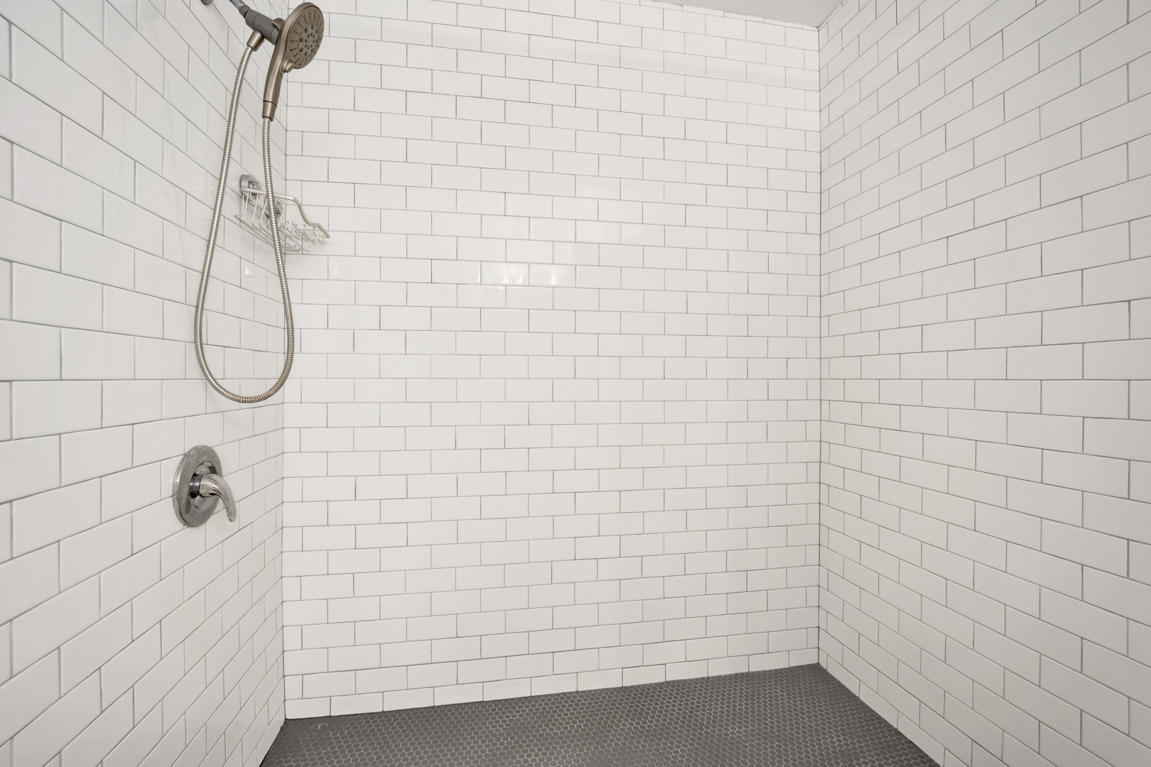 833 West 15th Place, Unit 511 Chicago, IL 60608 - Photo 14 of 21 a bathroom with a shower