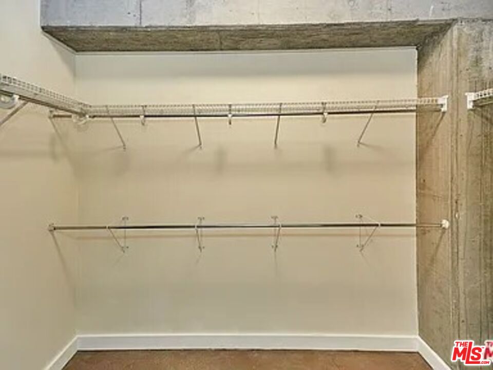 645 West 9th Street, Unit 240 Los Angeles, CA 90015 - Photo 2 of 25 a view of a walk in closet
