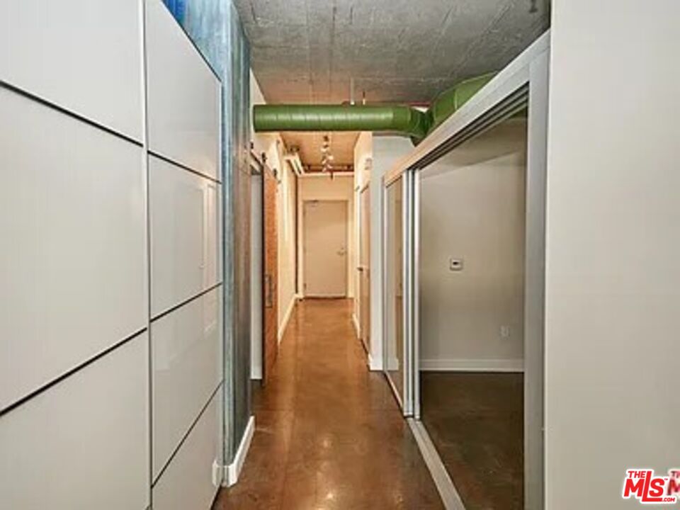 645 West 9th Street, Unit 240 Los Angeles, CA 90015 - Photo 4 of 25 a view of hallway with stairs