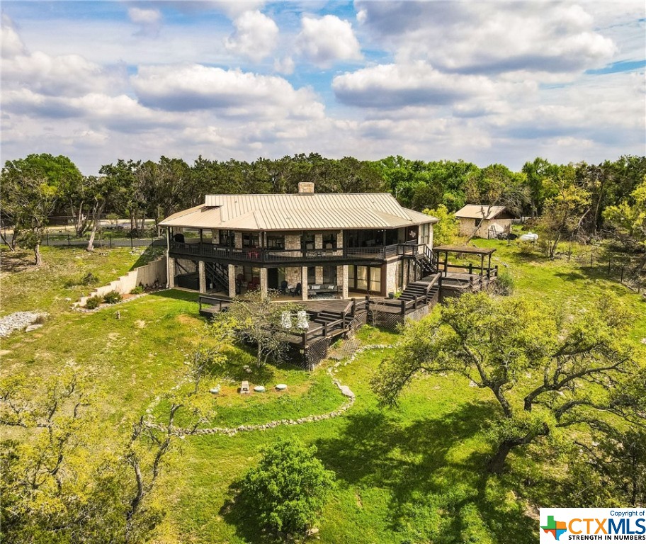 3940 Lariat Ridge New Braunfels, TX 78132 - Photo 1 of 1 a house with swimming pool in front of it