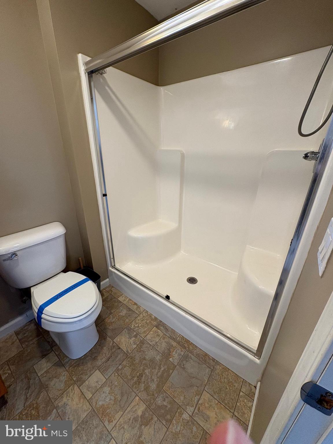 514 Kidney Road Genesee, PA 16923 - Photo 26 of 84 a bathroom with a toilet and a shower