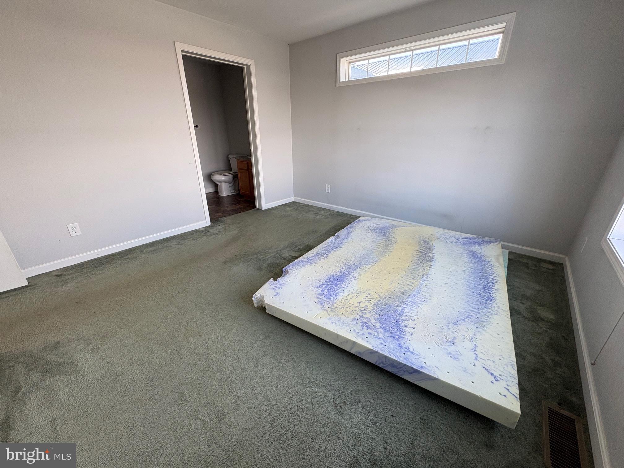 514 Kidney Road Genesee, PA 16923 - Photo 34 of 84 a bed sitting in a bedroom next to a window