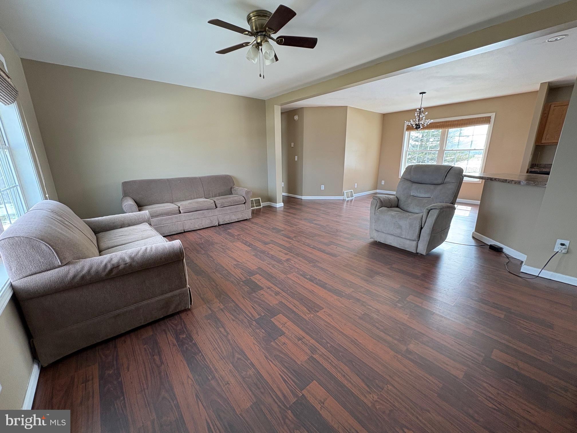 514 Kidney Road Genesee, PA 16923 - Photo 7 of 84 a living room with furniture and a wooden floor