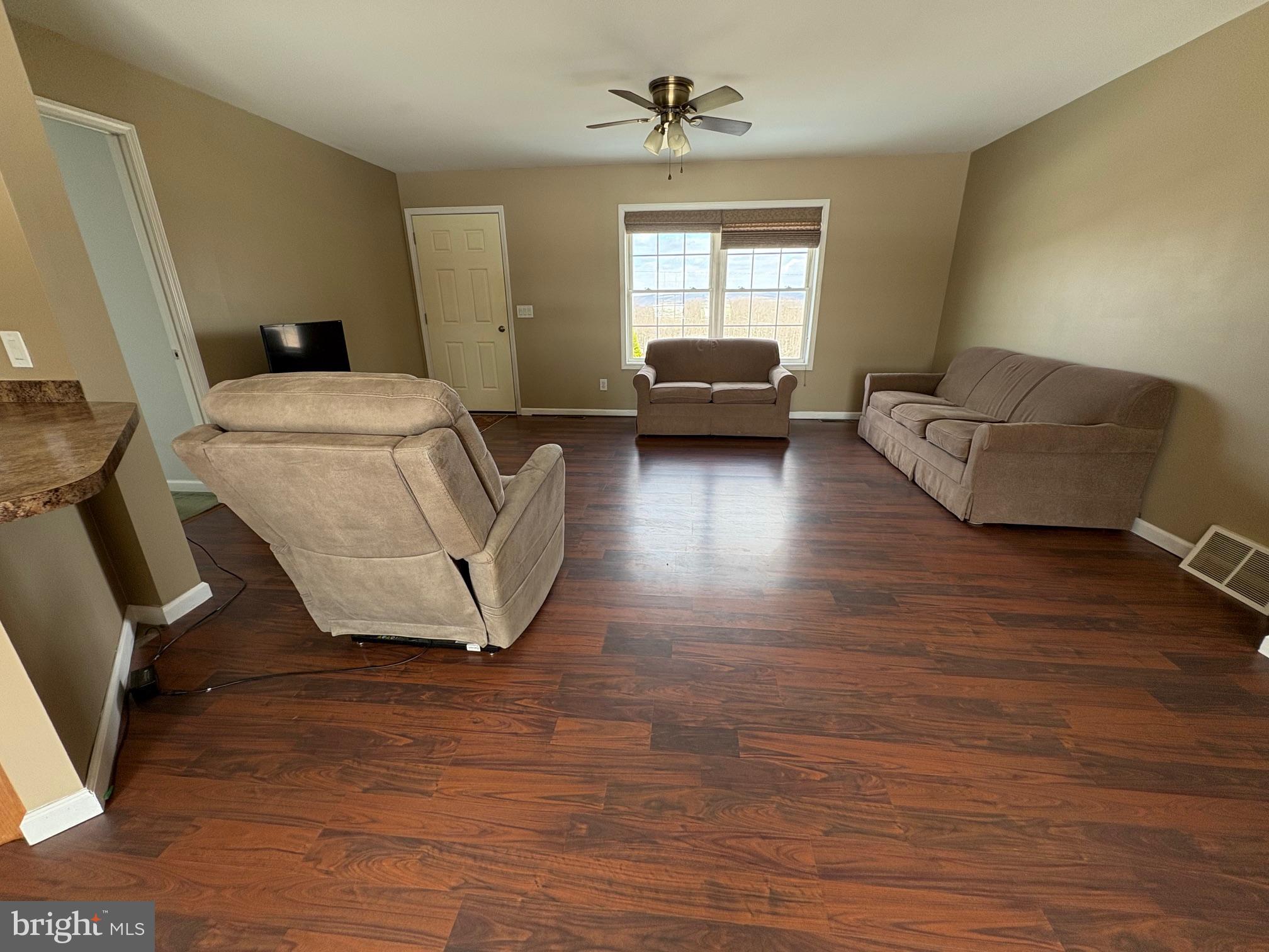514 Kidney Road Genesee, PA 16923 - Photo 8 of 84 a living room with furniture and a large window