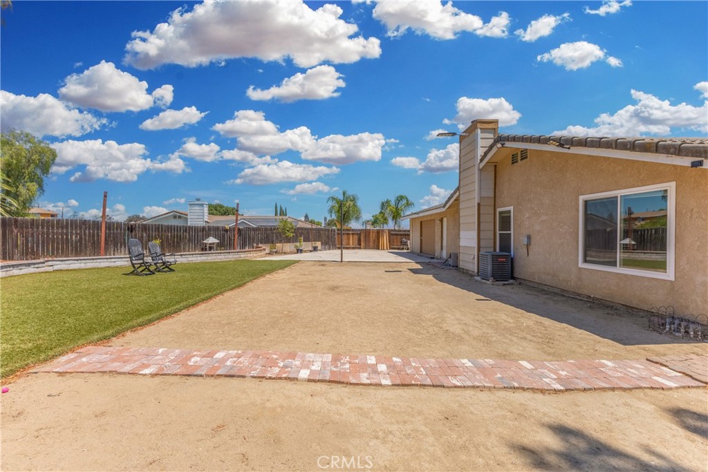 12011 Quantico Drive Riverside, CA 92505 - Photo 53 of 75 a view of a yard with table and chairs