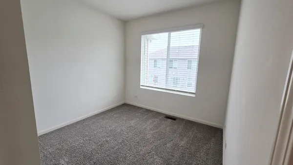 a bathroom with a sink a mirror toilet and bathtub