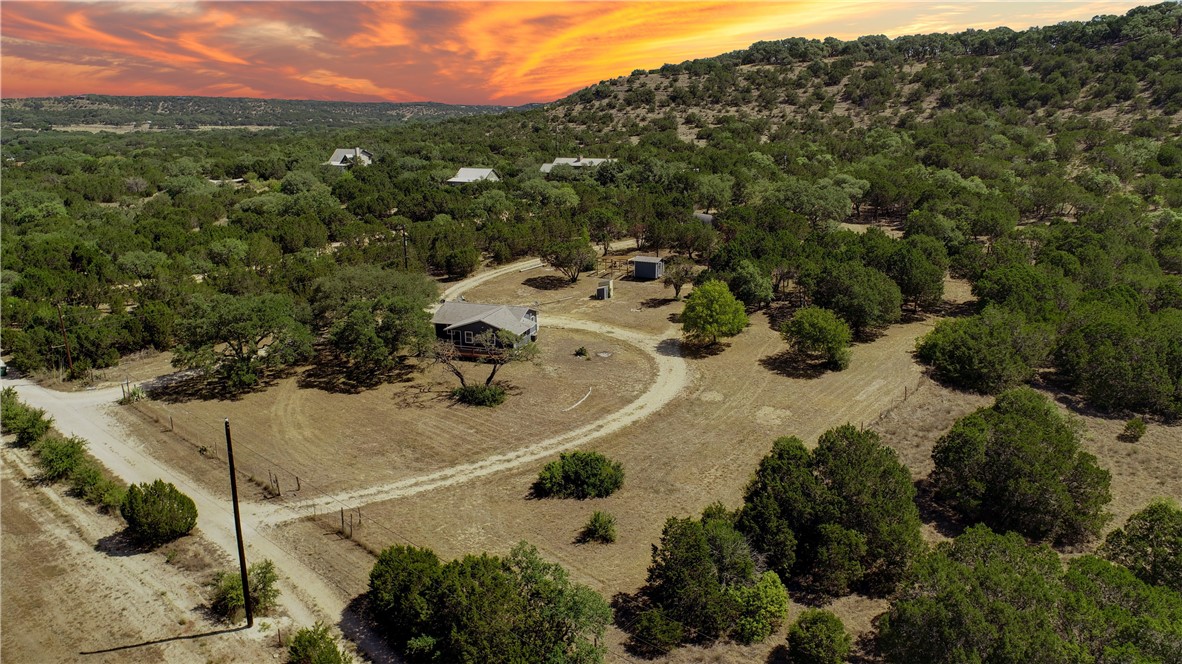 839 Caliche Road Wimberley, TX 78676 - Photo 1 of 1 This 4-acre tract provides many possiblities for an amazing homesite with panoramic views. Live in the 2/2 ranch house at the bottom of the tract while your build or use it for your office or a rental!