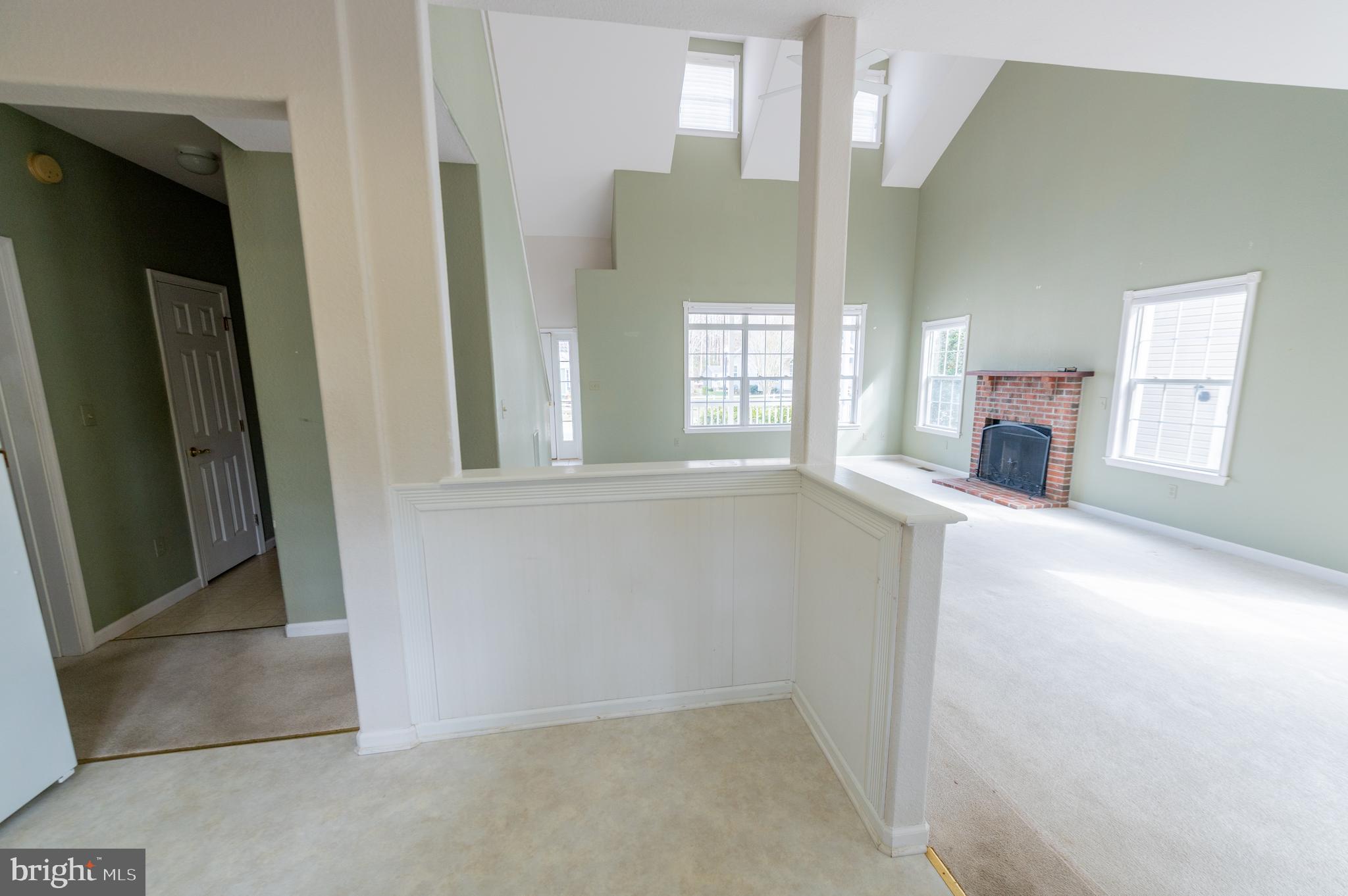 62 Hingham Lane Berlin, MD 21811 - Photo 41 of 44 an empty room with windows and entrance