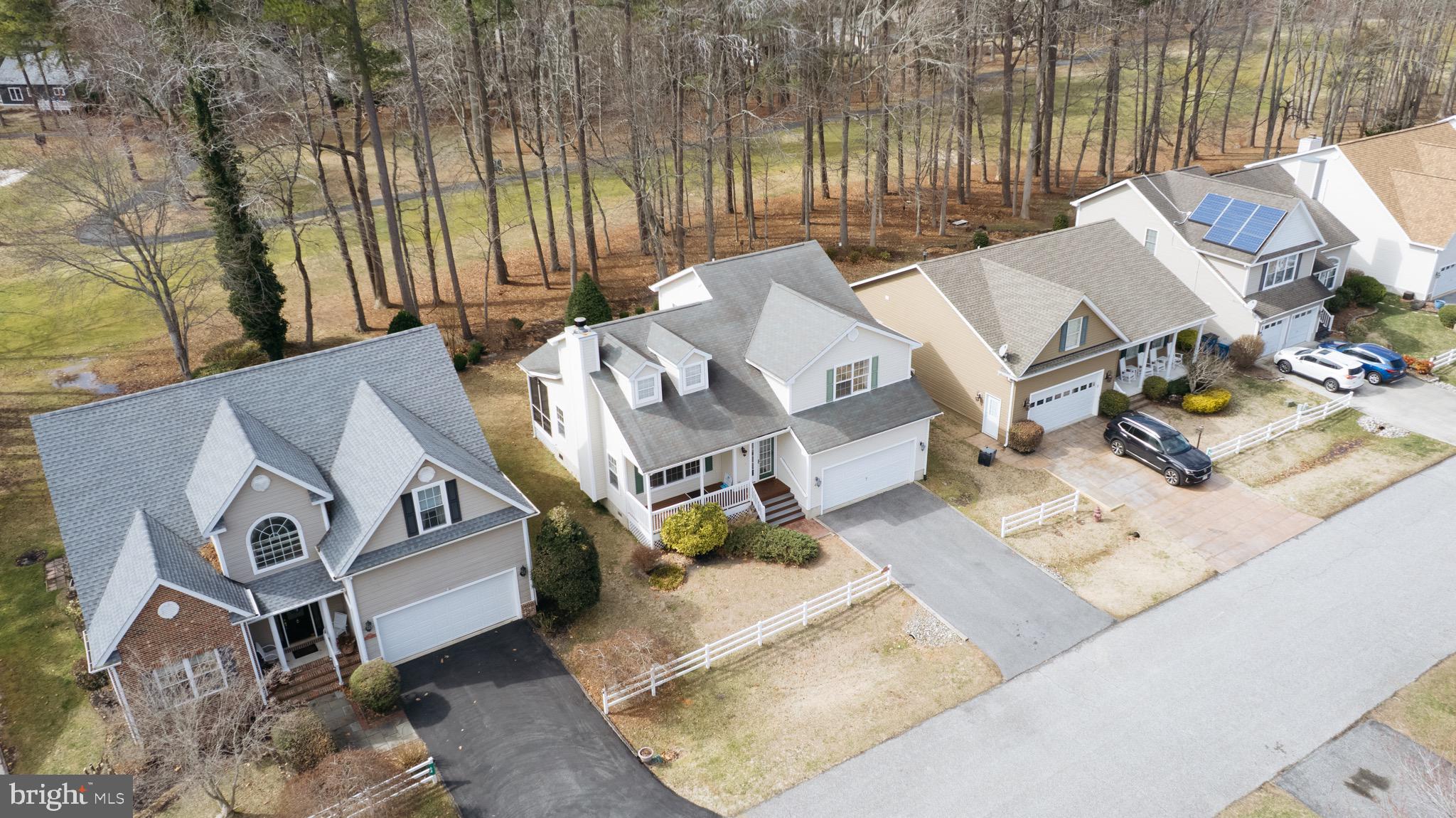 62 Hingham Lane Berlin, MD 21811 - Photo 5 of 44 an aerial view of residential house with outdoor space and seating