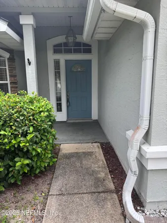 a view of a back yard of the house
