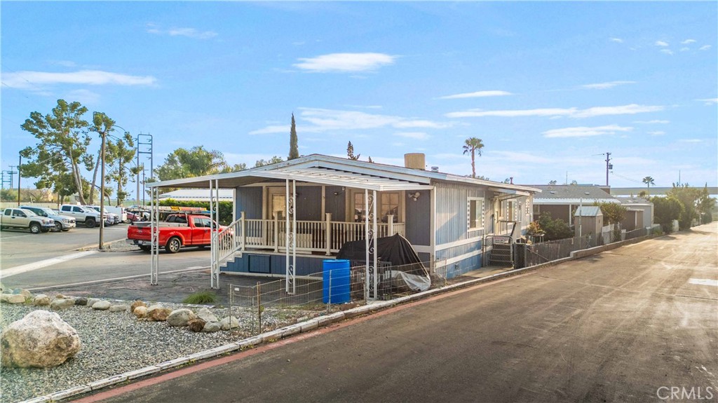 12401 Filmore Street, Unit 641 Sylmar, CA 91342 - Photo 2 of 24 a car parked in front of a house