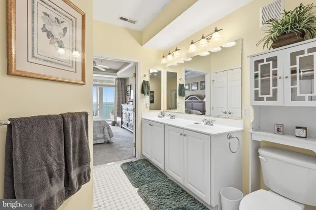 a view of a building with a swimming pool and a yard