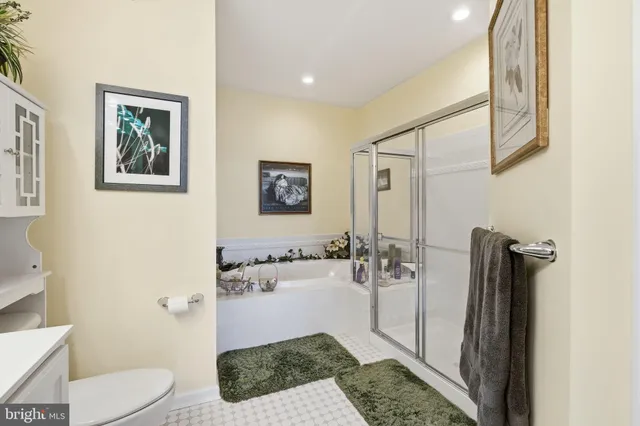 a picture of a bathroom with a shower curtain