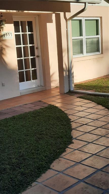 1333 Bender Avenue Holly Hill, FL 32117 - Photo 15 of 37 a view of front door of house with an outdoor space