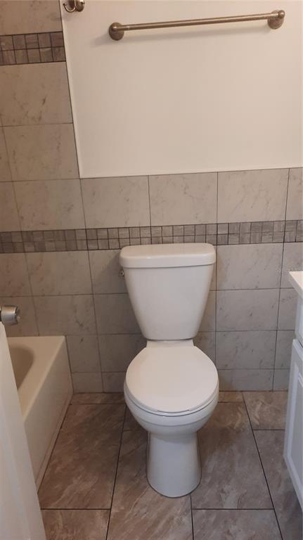 1333 Bender Avenue Holly Hill, FL 32117 - Photo 24 of 37 a bathroom with a toilet and a sink