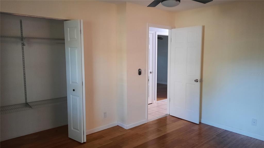 1333 Bender Avenue Holly Hill, FL 32117 - Photo 29 of 37 a view of an empty room with wooden floor