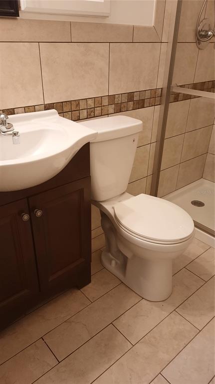 1333 Bender Avenue Holly Hill, FL 32117 - Photo 30 of 37 a bathroom with a toilet and a sink