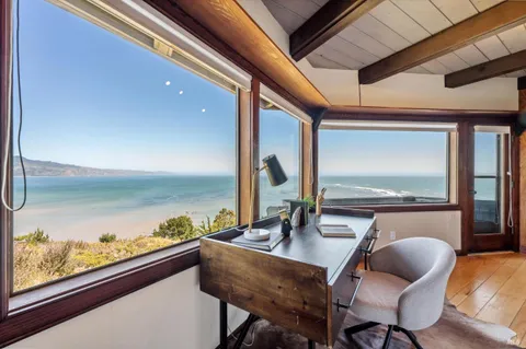 a view of ocean from a balcony