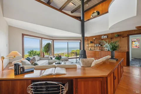 a view of a balcony with furniture