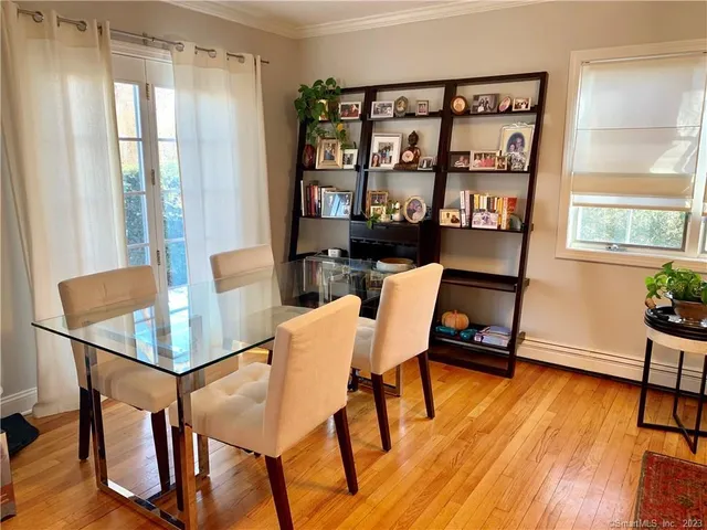 a workspace with furniture and a book shelf