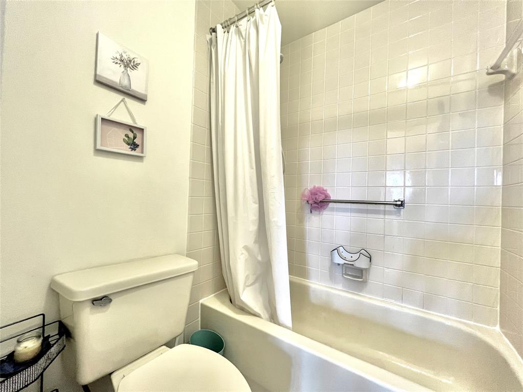 7750 Northwest 79th Avenue, Unit H5 Tamarac, FL 33321 - Photo 19 of 28 a bathroom with a sink and a toilet