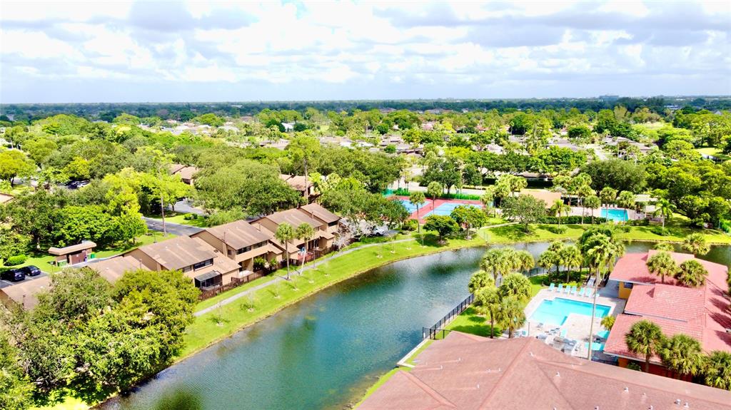 7750 Northwest 79th Avenue, Unit H5 Tamarac, FL 33321 - Photo 23 of 28 a view of a yard with plants