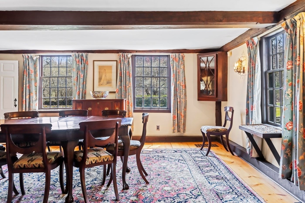 9 Maple Street Wenham, MA 01984 - Photo 22 of 42 a view of a dining room with furniture window and wooden floor