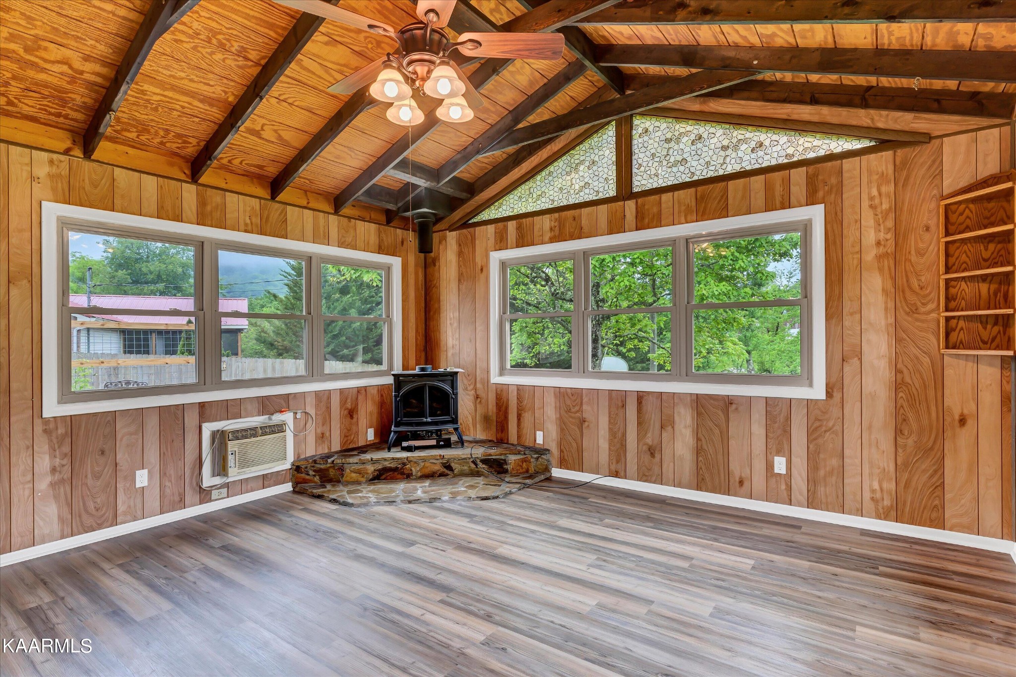 615 Kings Row Sevierville, TN 37863 - Photo 15 of 26 a view of a room with wooden floor and windows