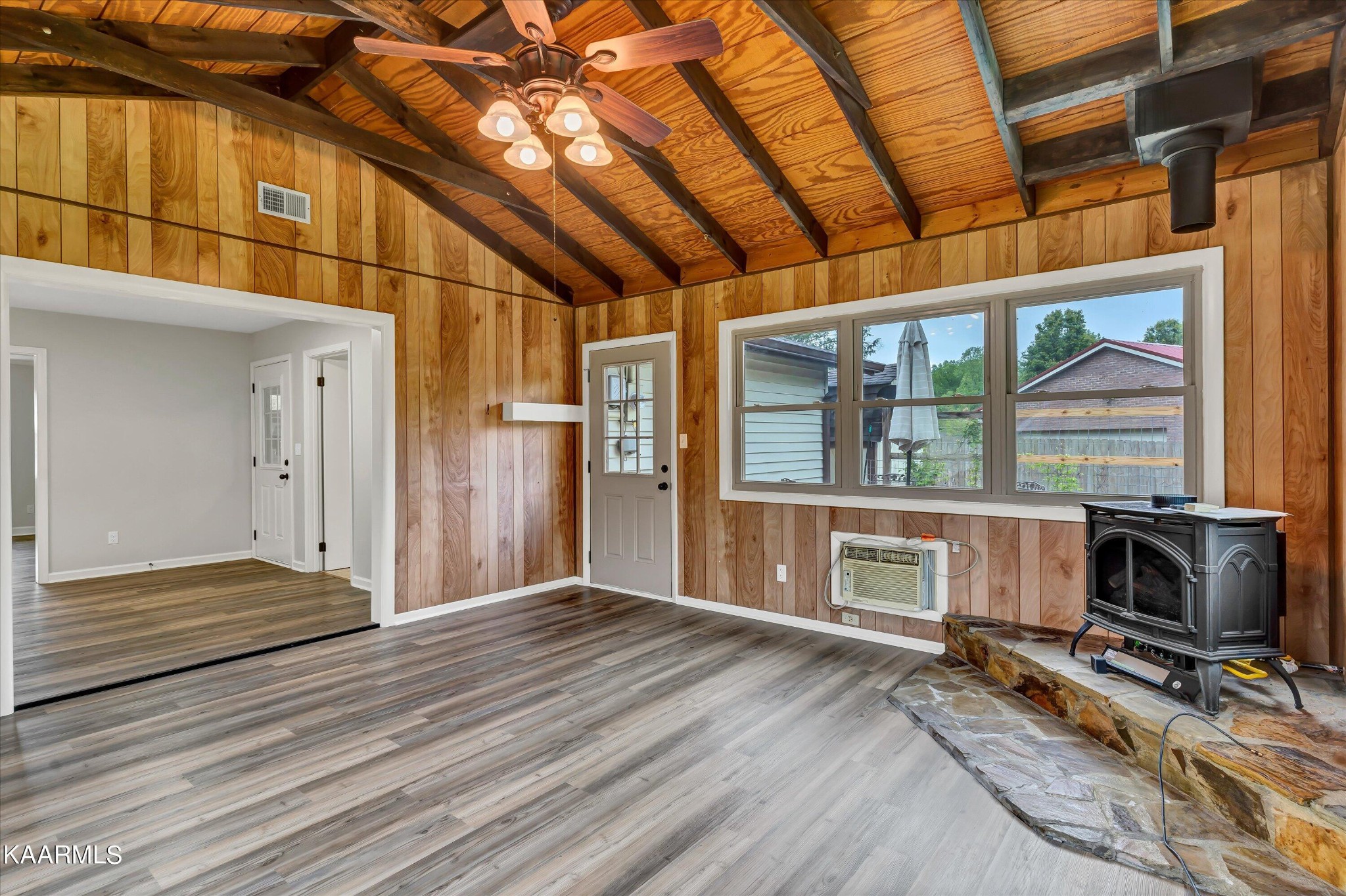 615 Kings Row Sevierville, TN 37863 - Photo 16 of 26 a view of a room with wooden floor and iron stairs