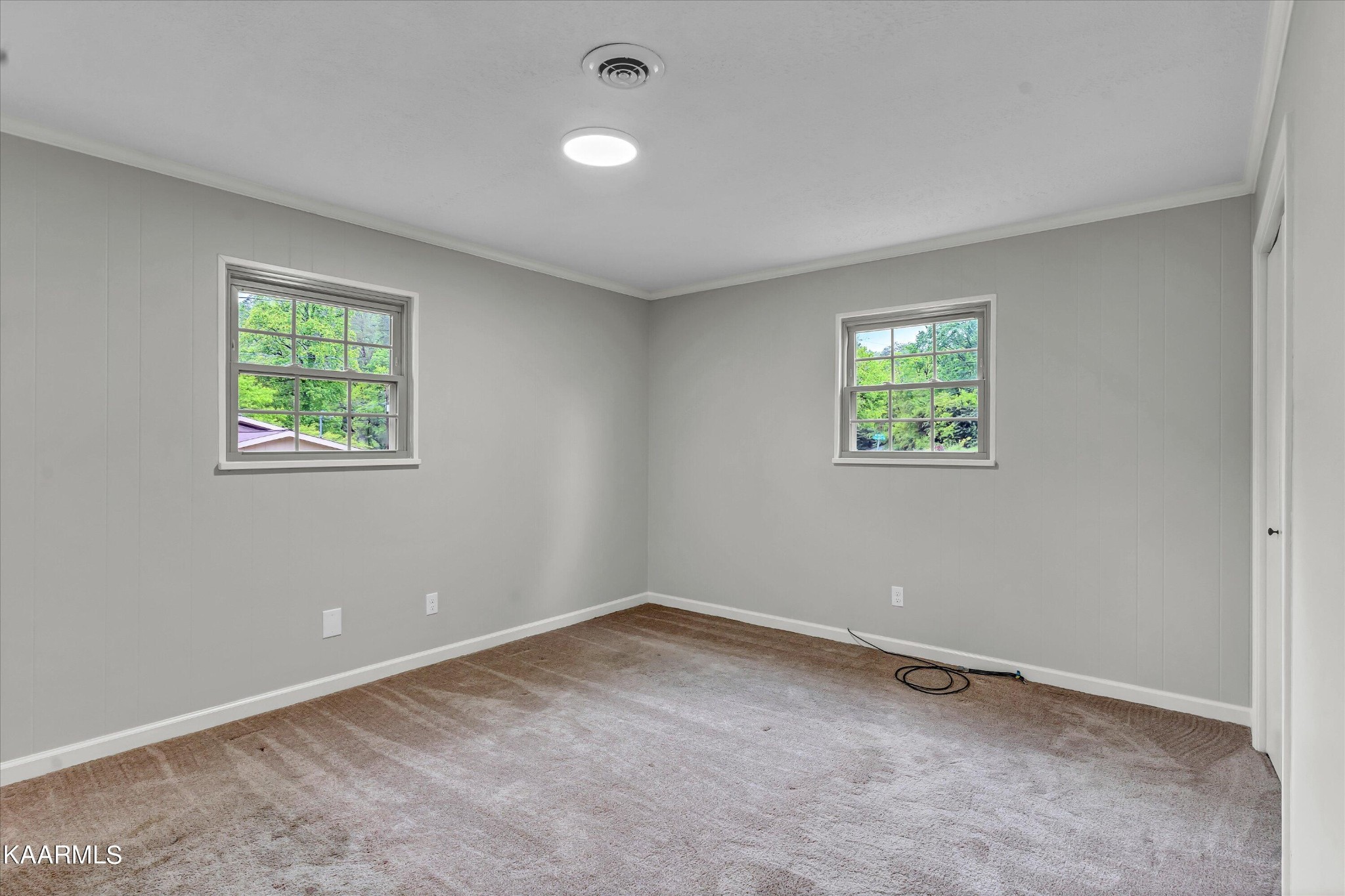 615 Kings Row Sevierville, TN 37863 - Photo 21 of 26 an empty room with windows