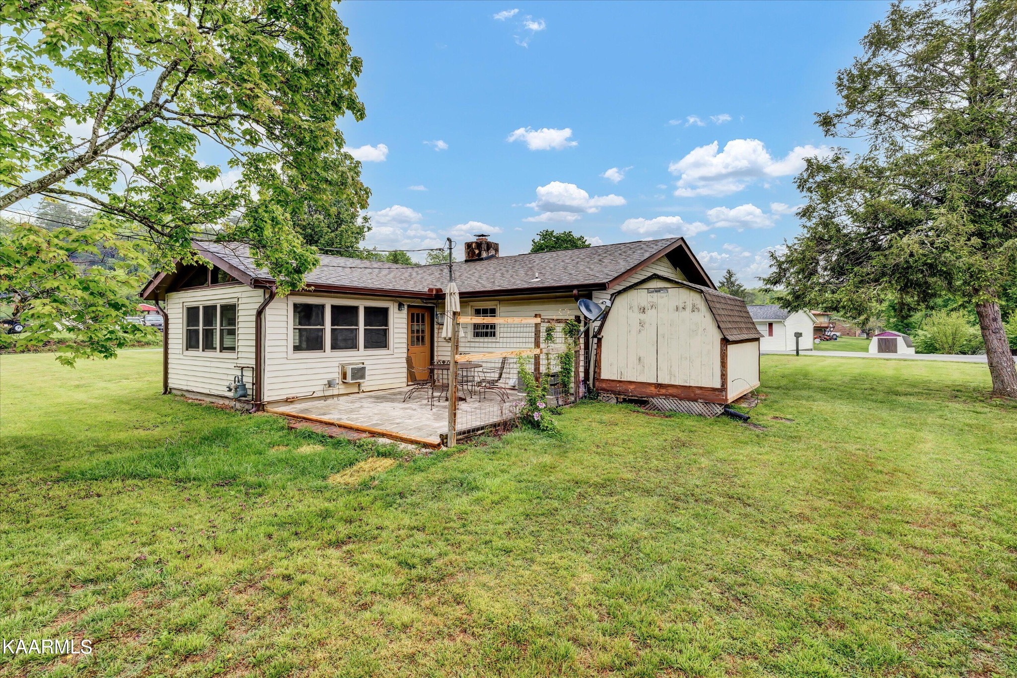 615 Kings Row Sevierville, TN 37863 - Photo 25 of 26 a front view of a house with a yard and garage