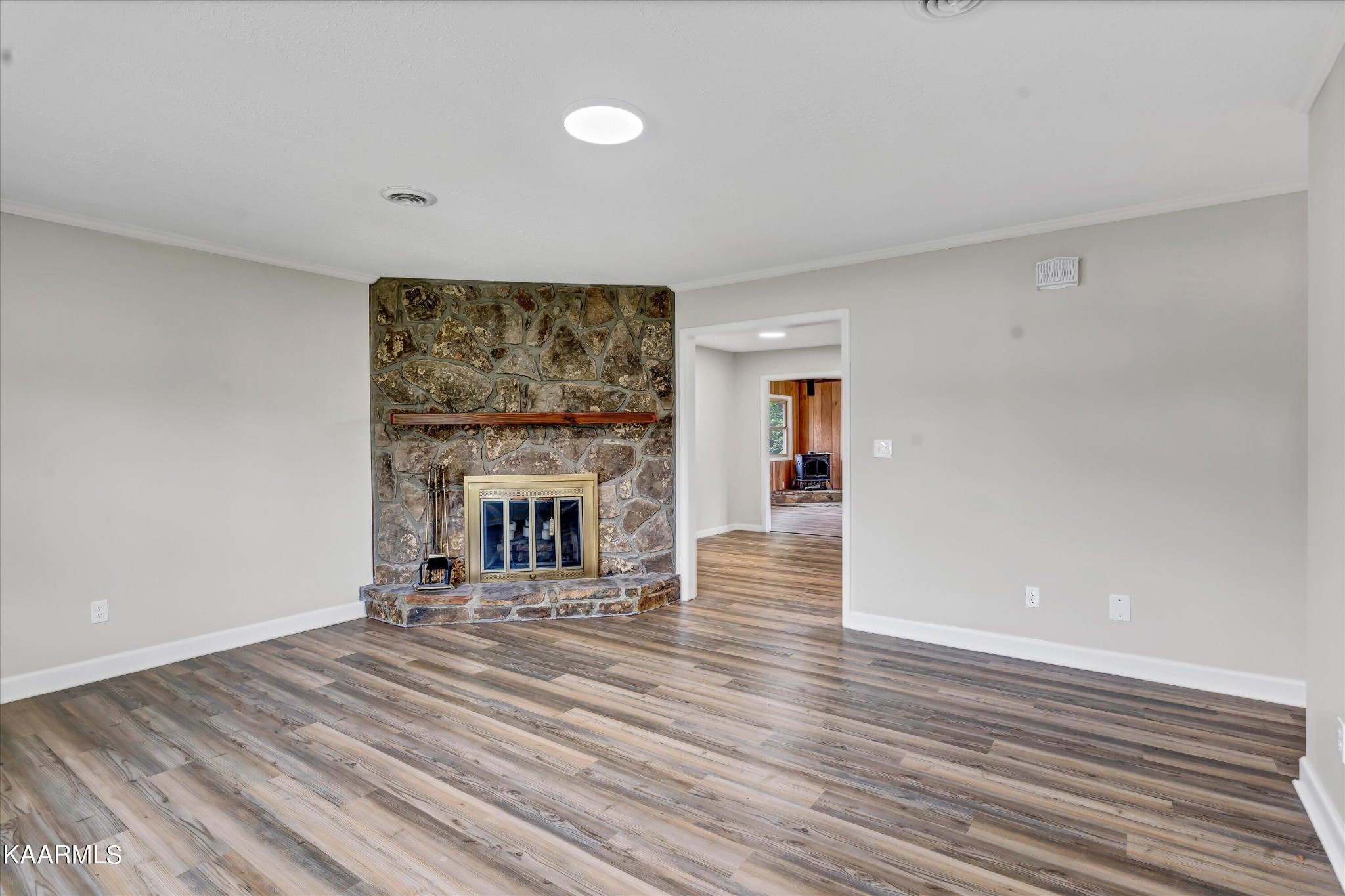 615 Kings Row Sevierville, TN 37863 - Photo 3 of 26 a living room with furniture and a fireplace
