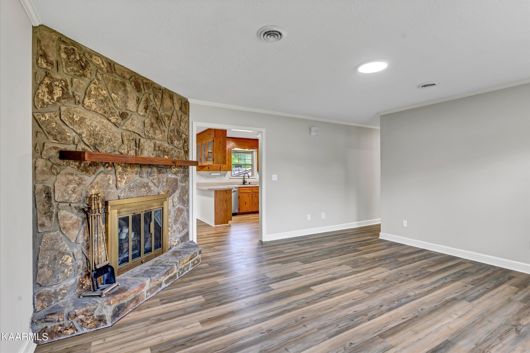 615 Kings Row Sevierville, TN 37863 - Photo 5 of 26 a view of a livingroom with wooden floor