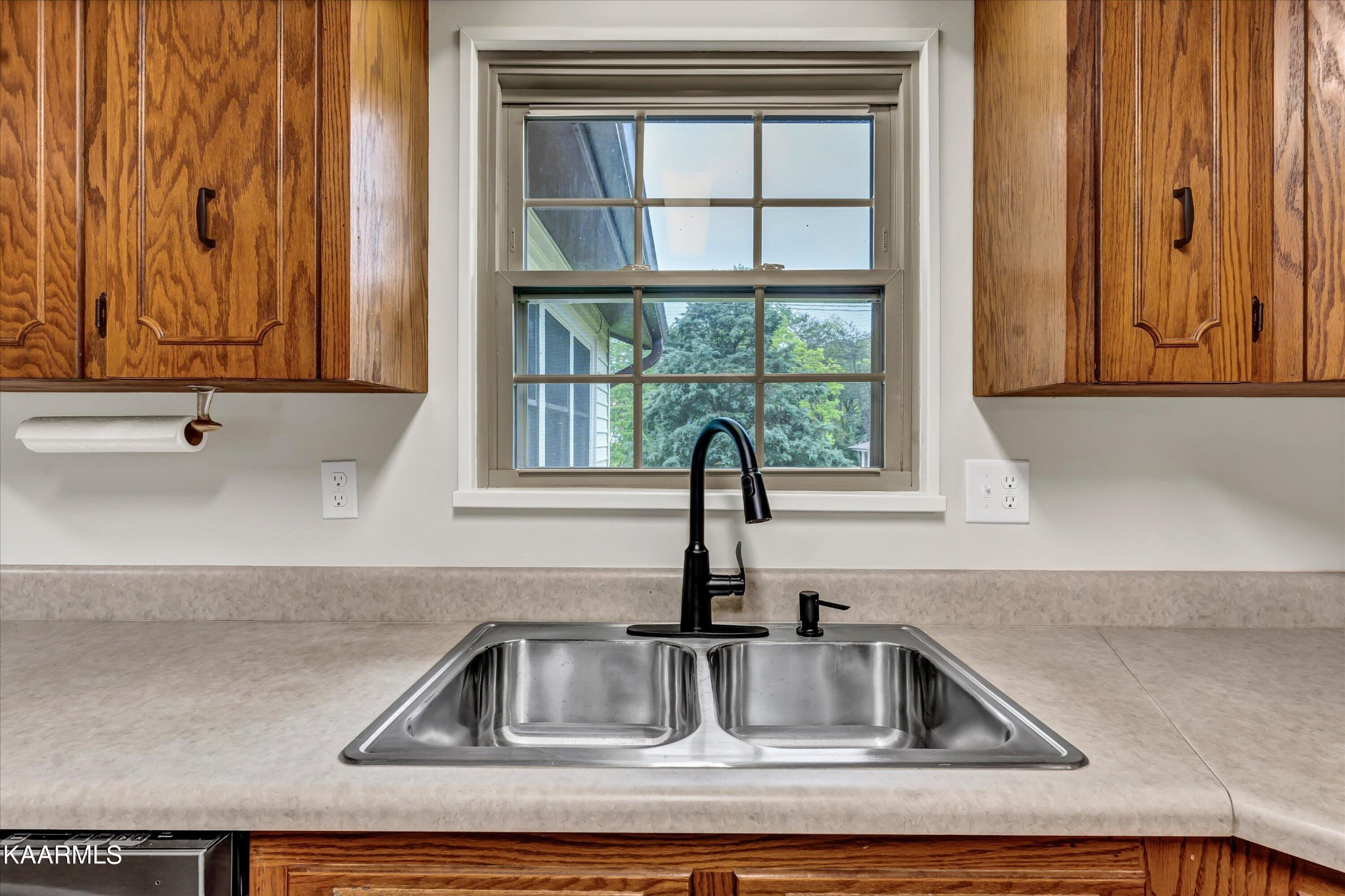 615 Kings Row Sevierville, TN 37863 - Photo 8 of 26 a kitchen with a sink and a window