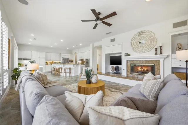 a view of a dining room with furniture window and chandelier