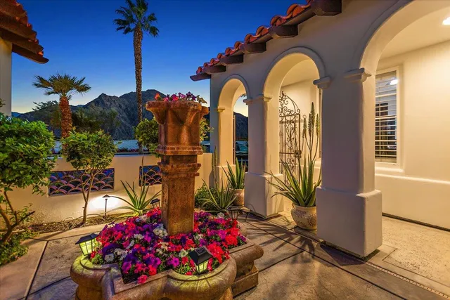 a kitchen with kitchen island a stove a sink and a refrigerator