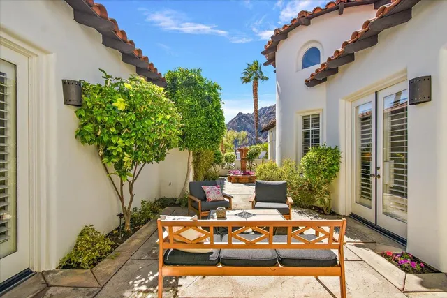 a kitchen with sink stove and cabinets
