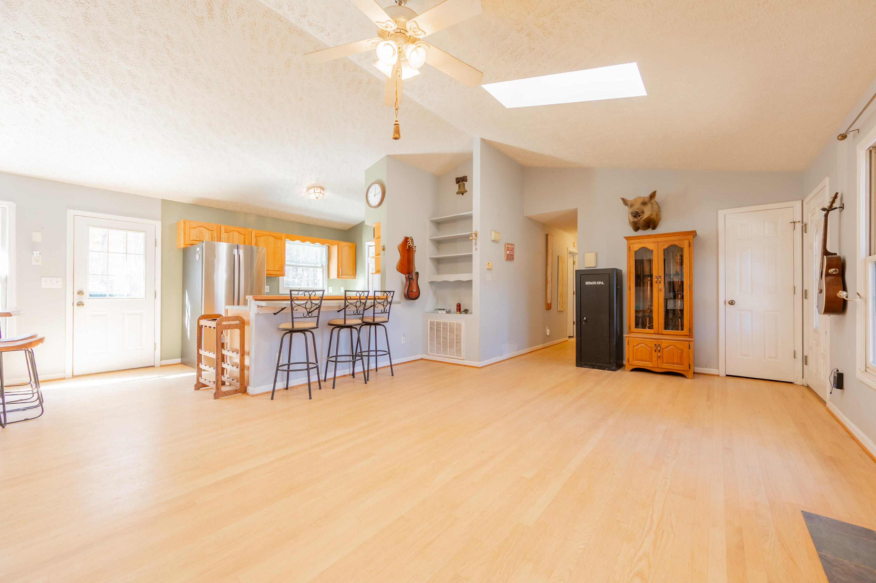 1126 Duncans Chapel Road Northwest Willis, VA 24380 - Photo 24 of 74 a view of a livingroom with furniture and a ceiling fan