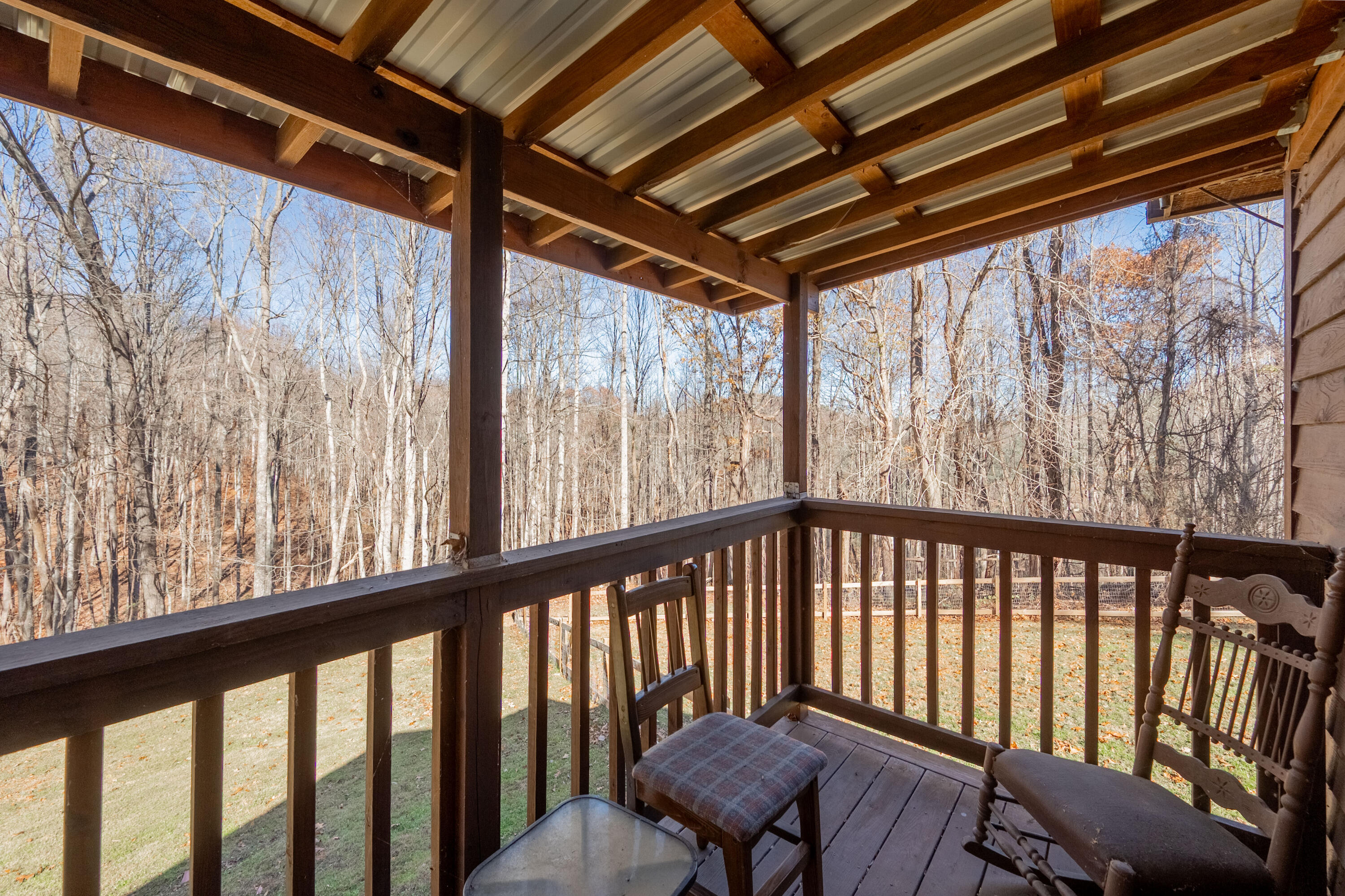 1126 Duncans Chapel Road Northwest Willis, VA 24380 - Photo 36 of 74 a view of a porch with furniture