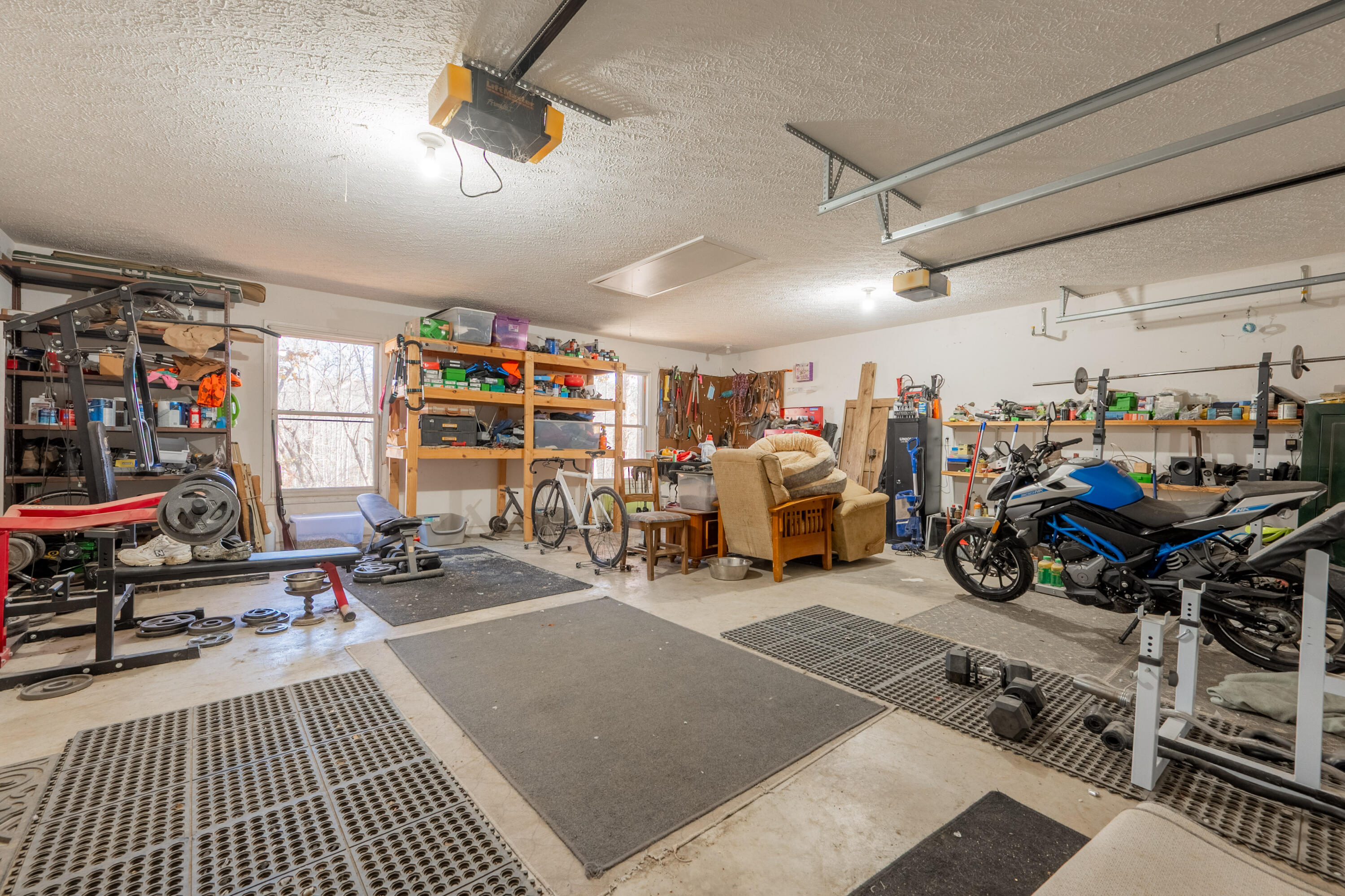 1126 Duncans Chapel Road Northwest Willis, VA 24380 - Photo 38 of 74 a view of a room with gym equipment