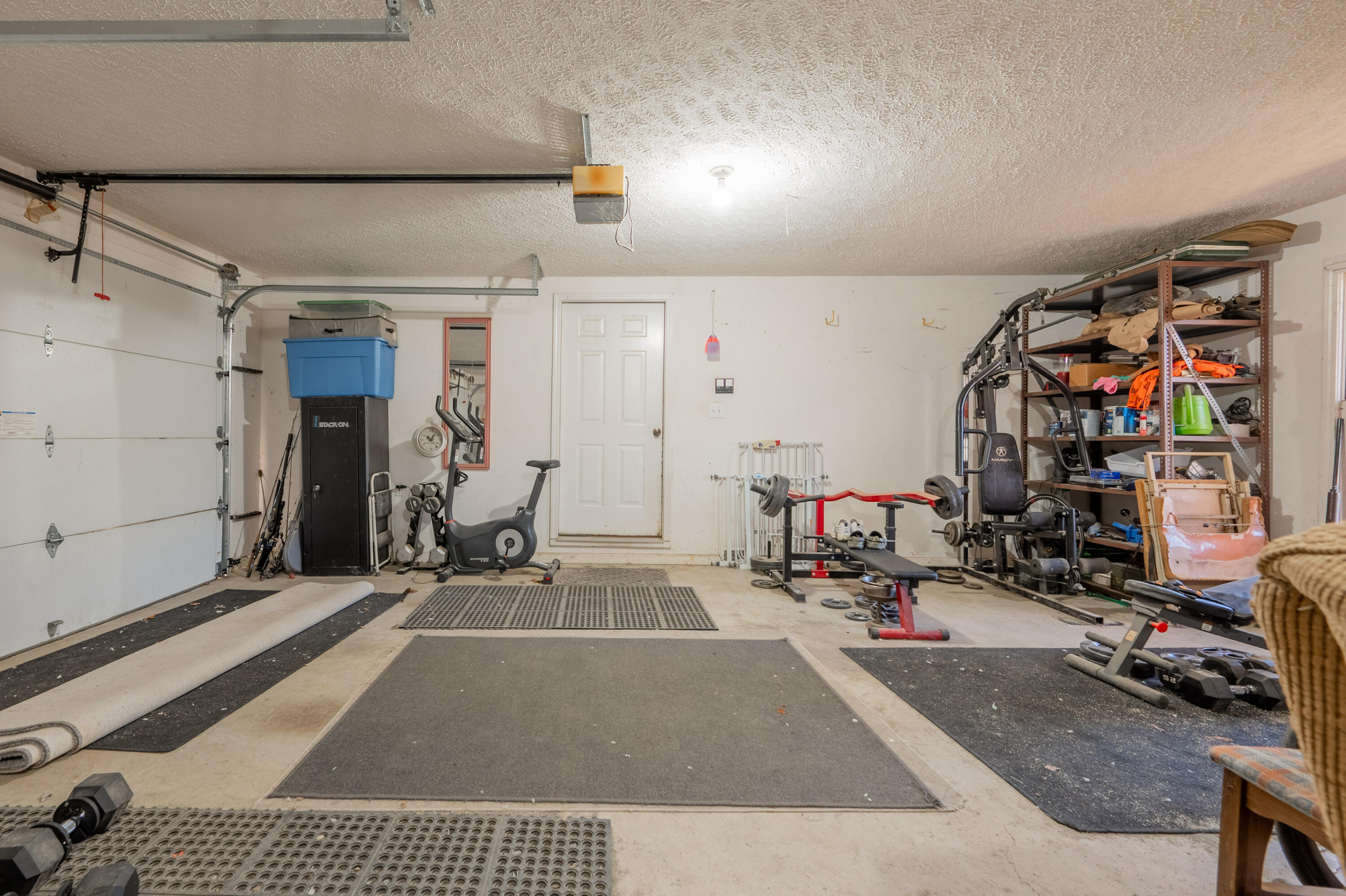 1126 Duncans Chapel Road Northwest Willis, VA 24380 - Photo 39 of 74 a room with gym equipment and view of entryway