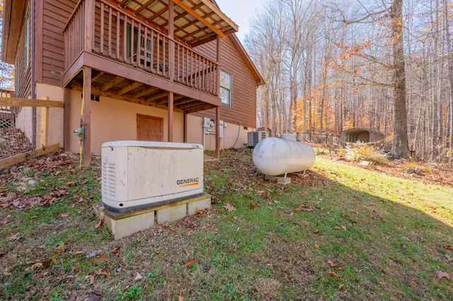 a view of a backyard with a small yard