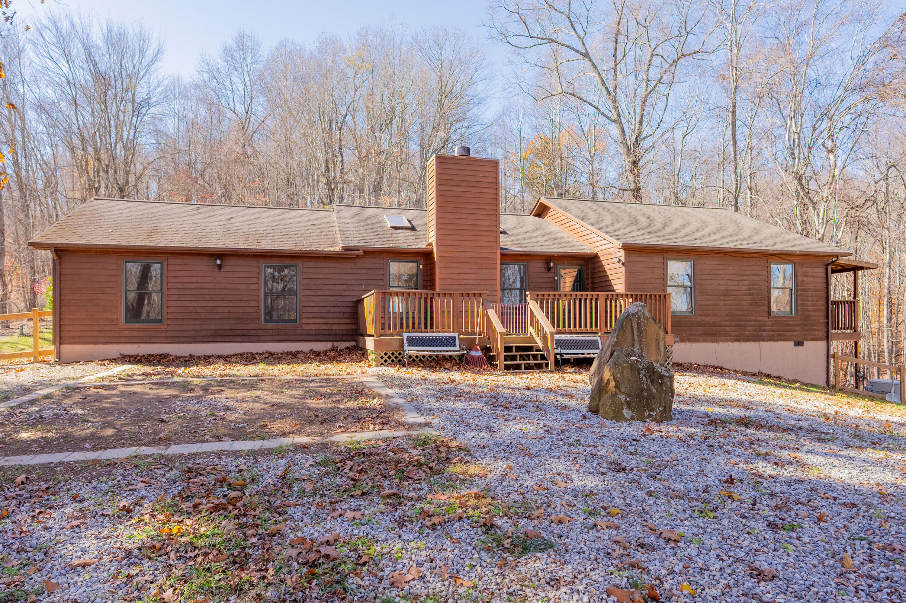1126 Duncans Chapel Road Northwest Willis, VA 24380 - Photo 5 of 74 a view of a house with a yard and large tree